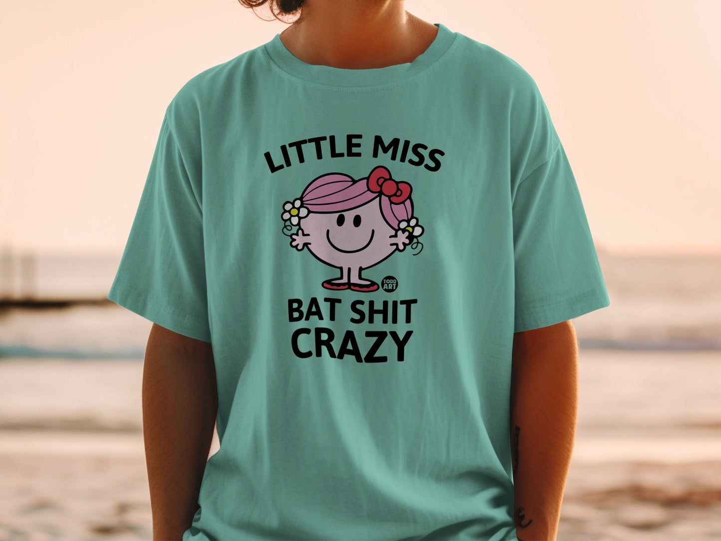 T-shirt with Little Miss Bat Shit Crazy graphic and a pink bow.