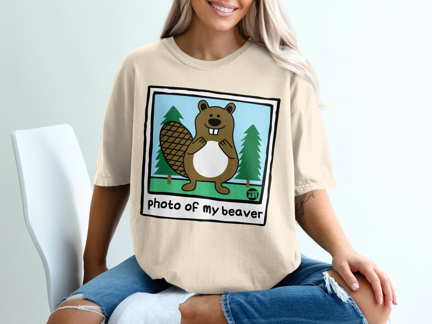 Cream t-shirt featuring cartoon beaver illustration with text "photo of my beaver".