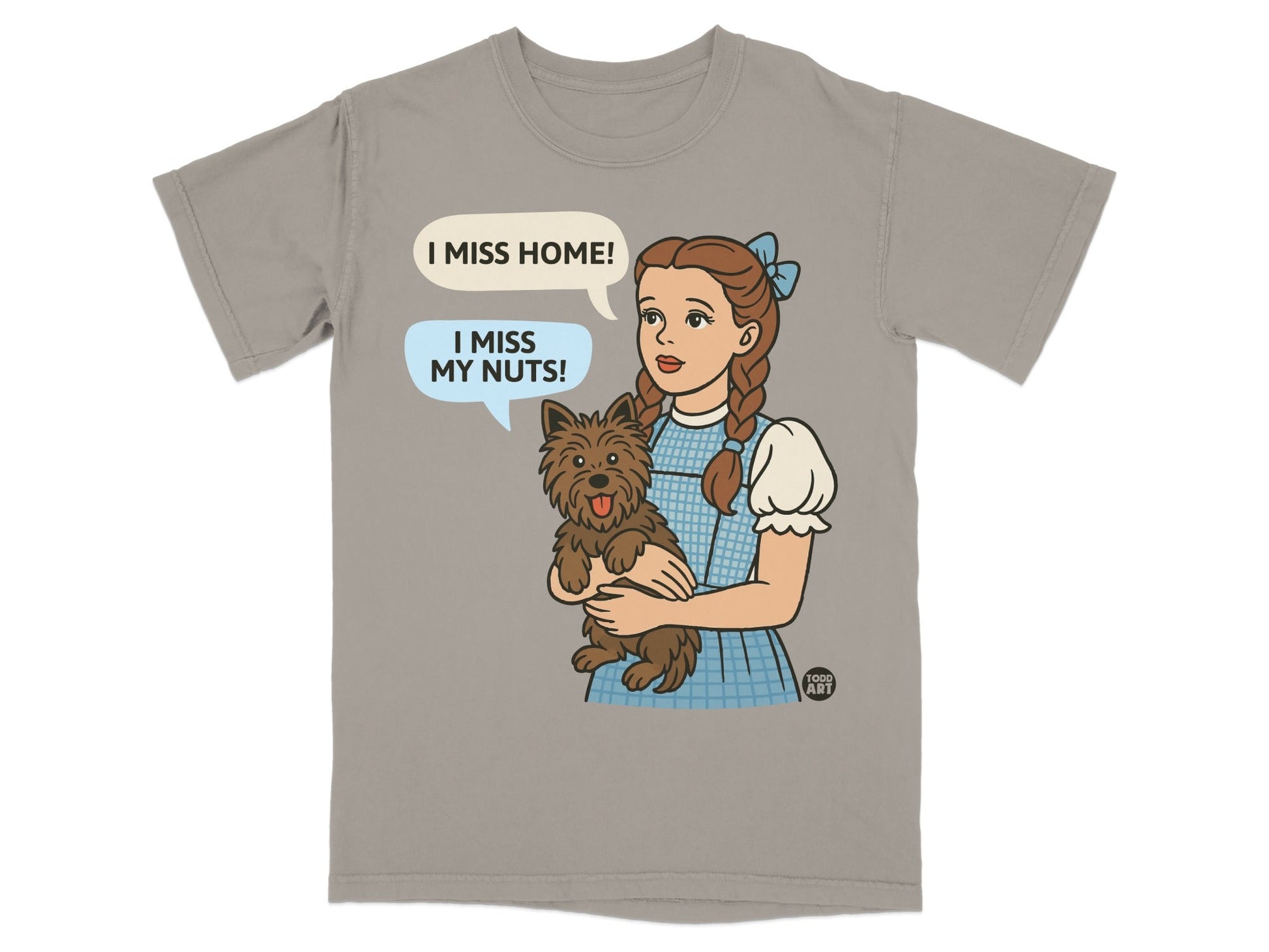 Dorothy and Toto on t-shirt, Dorothy says "I miss home! I miss my nuts!"