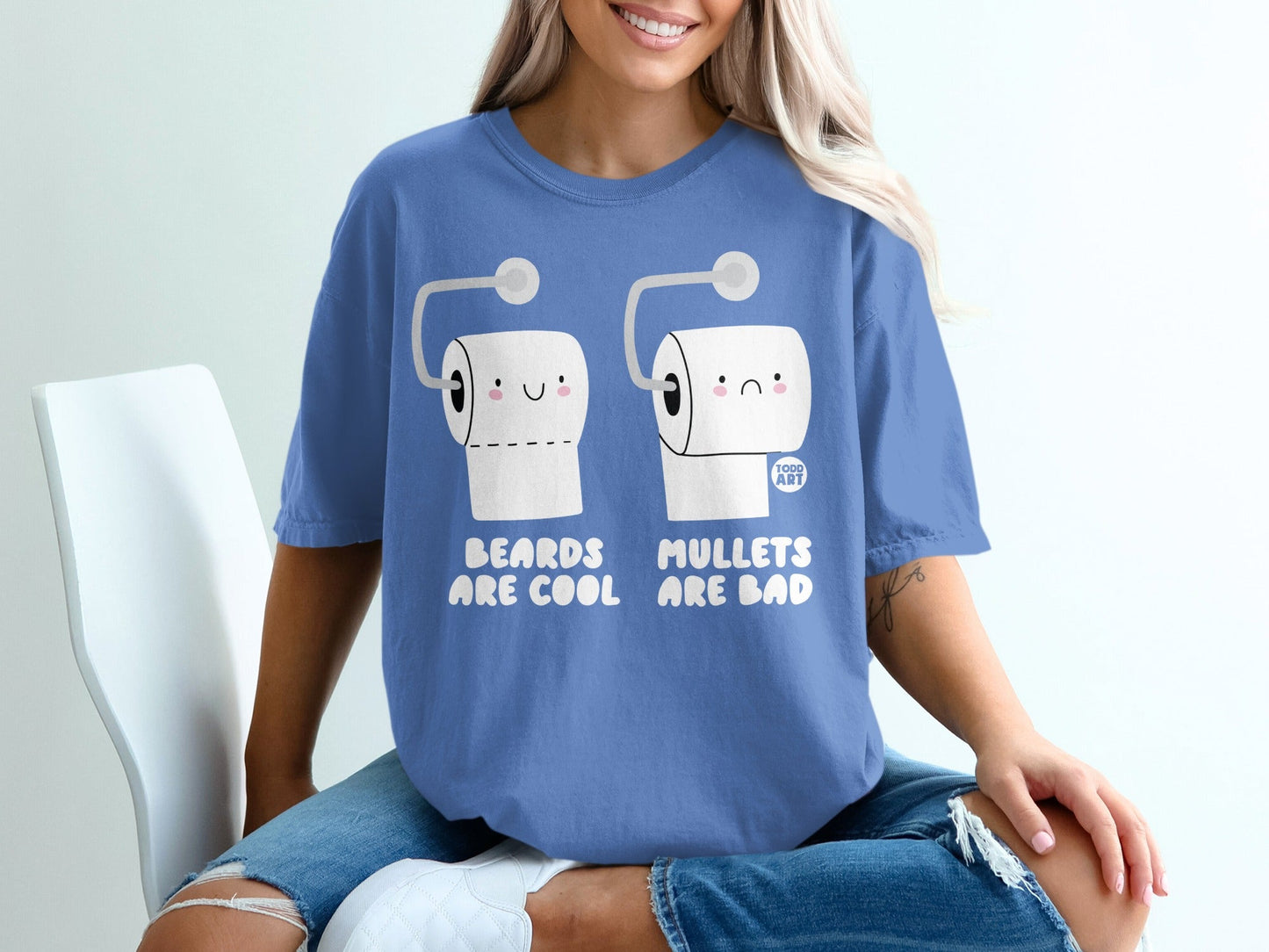 T-shirt with cartoon toilet paper rolls saying "Beards are cool, mullets are bad."