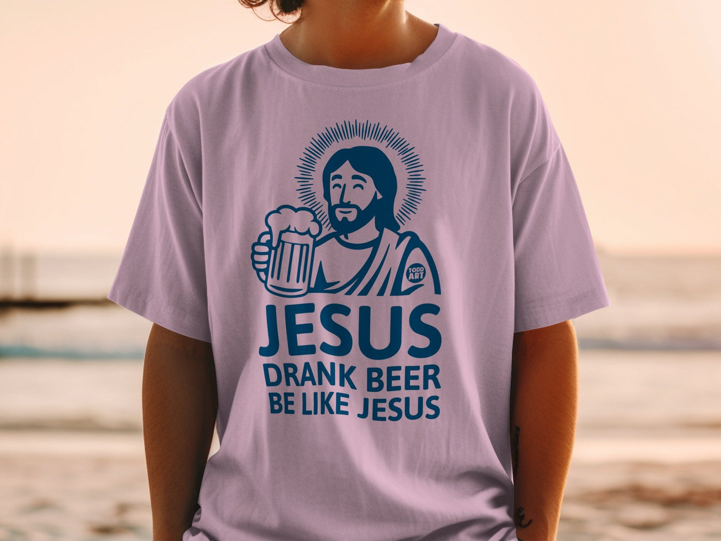 T-shirt with "JESUS DRANK BEER LIKE JESUS" and illustration of Jesus holding a beer.