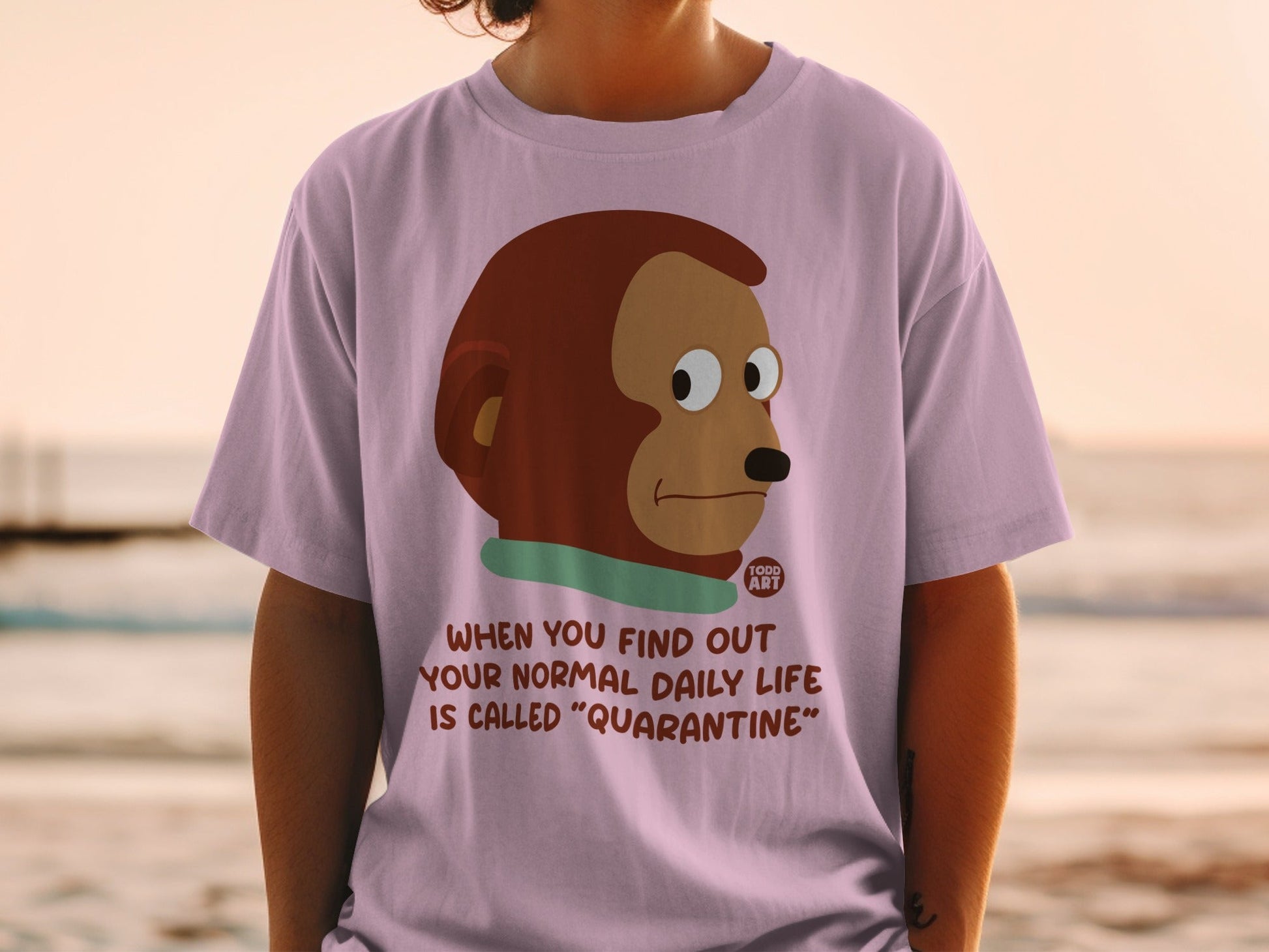 T-shirt with monkey graphic and text about quarantine.