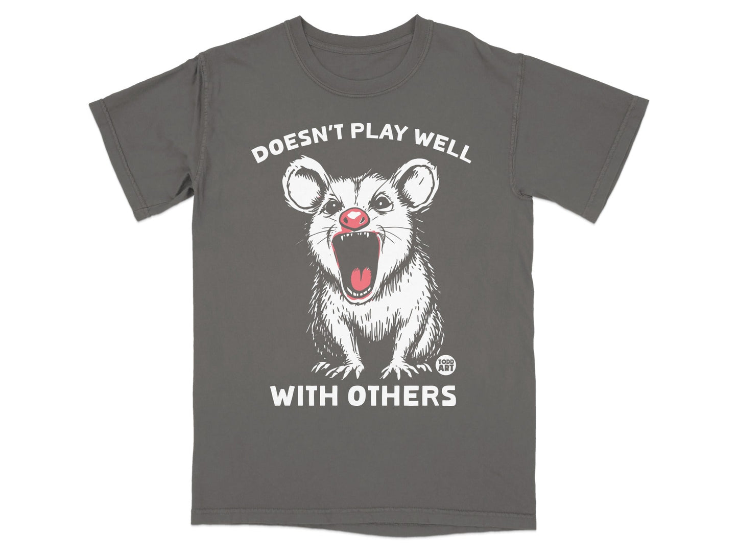 Graphic tee with a screaming opossum and text that reads "Doesn't Play Well With Others."