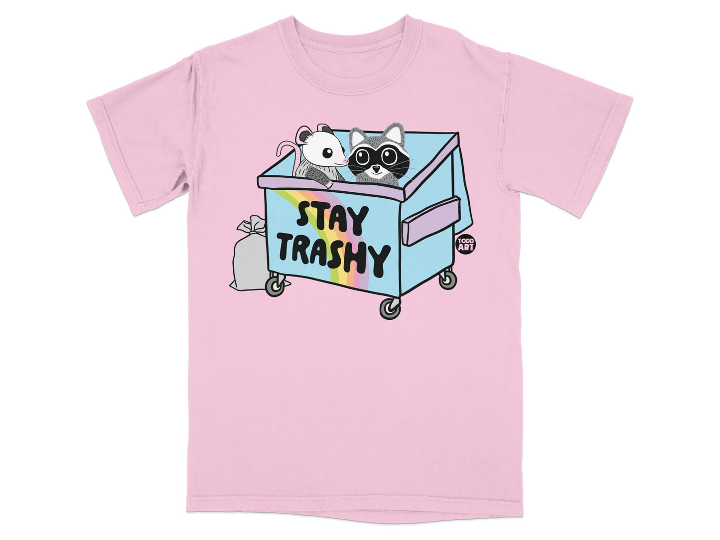 Pink t-shirt with raccoon and mouse in a dumpster with "STAY TRASHY" text.