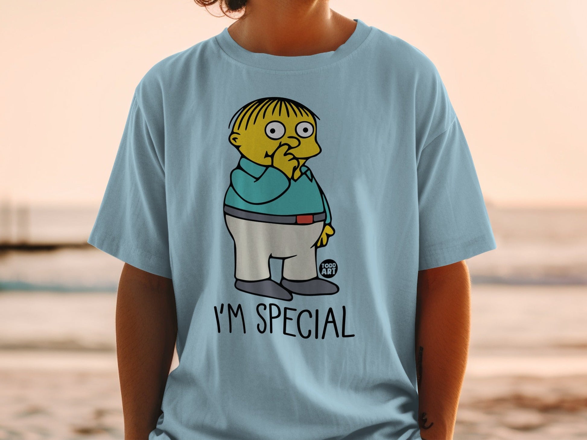 Ralph Wiggum from The Simpsons on a light blue t-shirt saying "I'm Special".