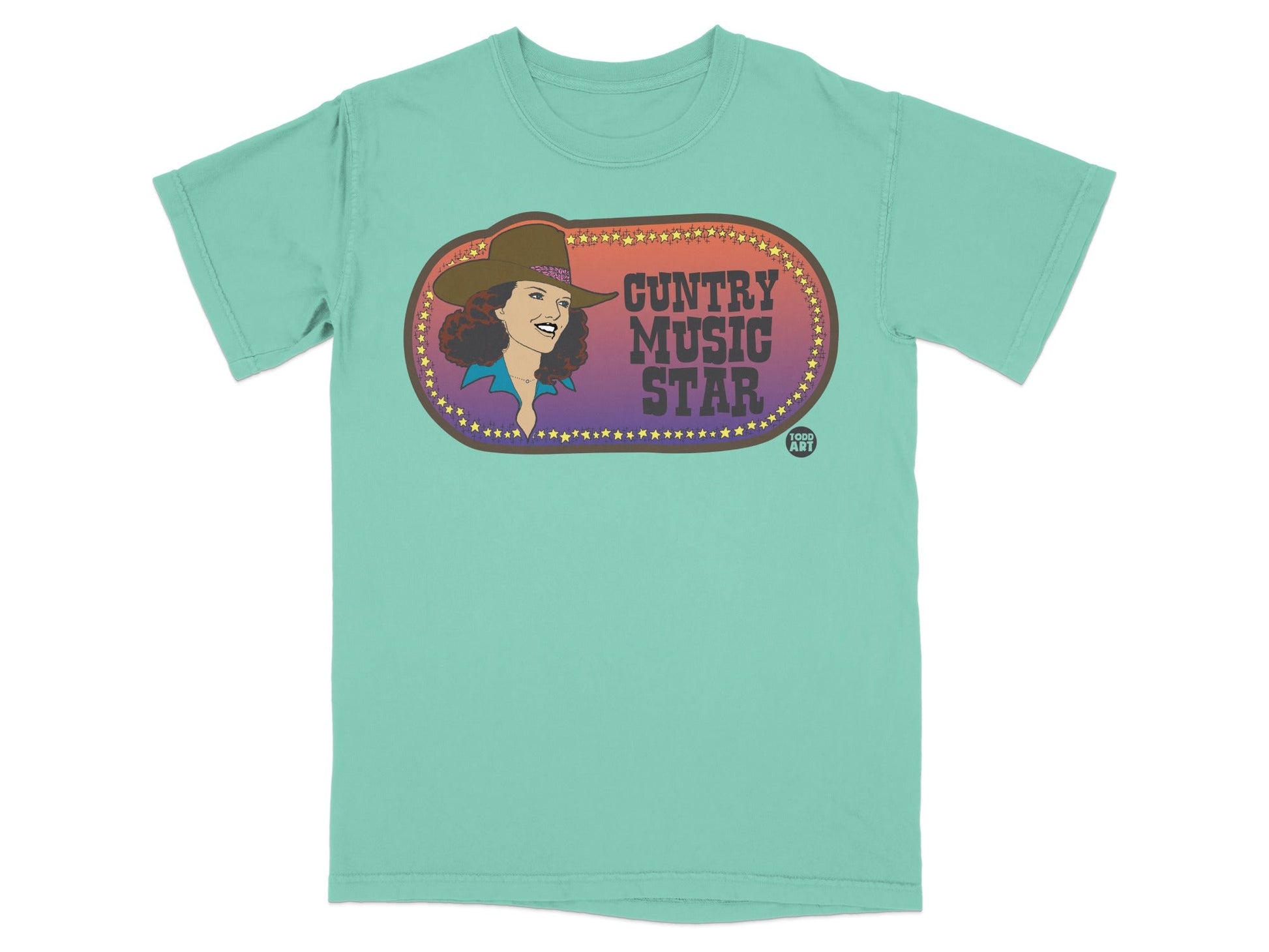 T-shirt with "Country Music Star" text and woman wearing a cowboy hat.