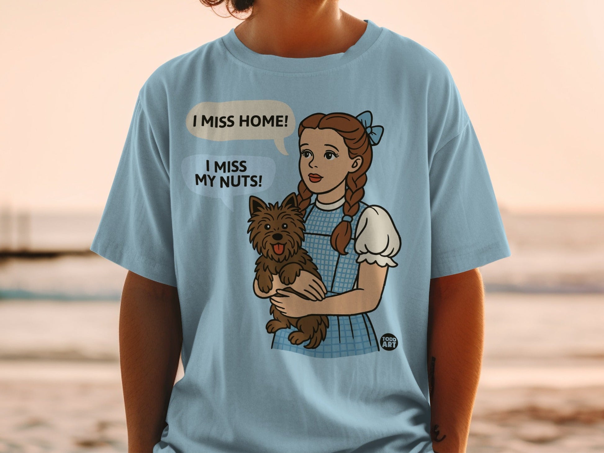 Dorothy holds Toto, saying "I miss my nuts!"