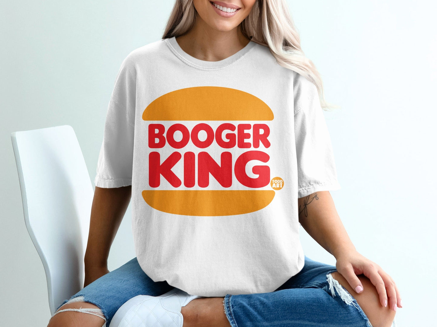 White t-shirt with "BOOGER KING" logo in orange and red on chest.