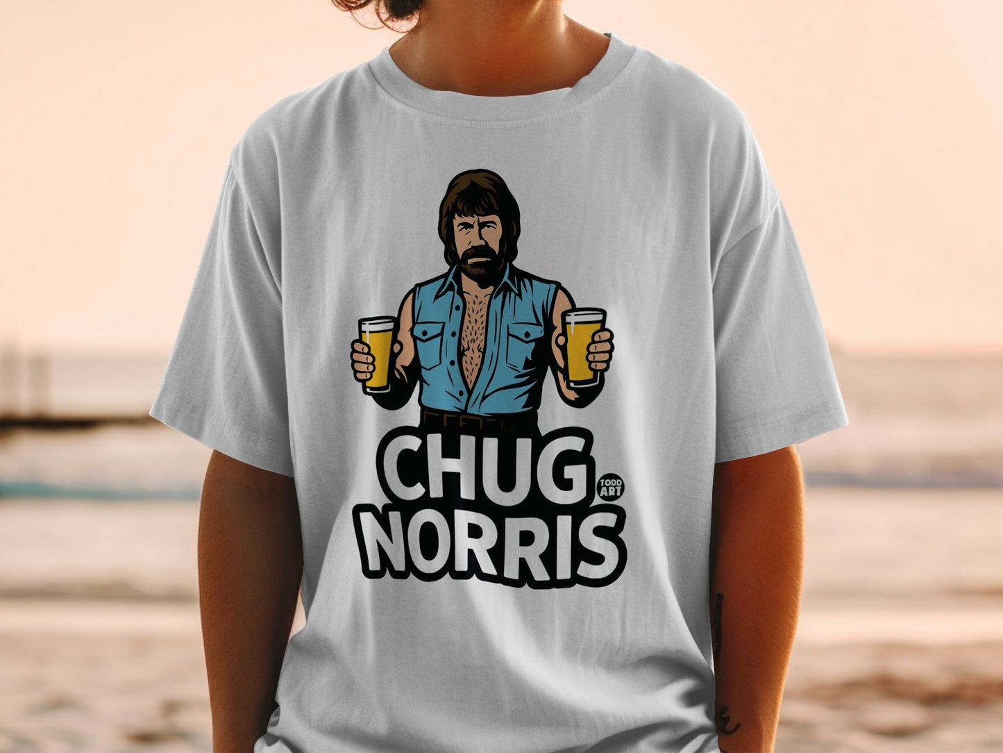 T-shirt graphic featuring Chuck Norris holding two beers.