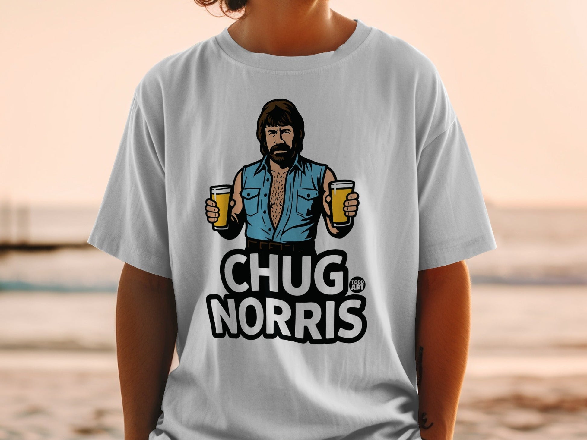 T-shirt graphic featuring Chuck Norris holding two beers.