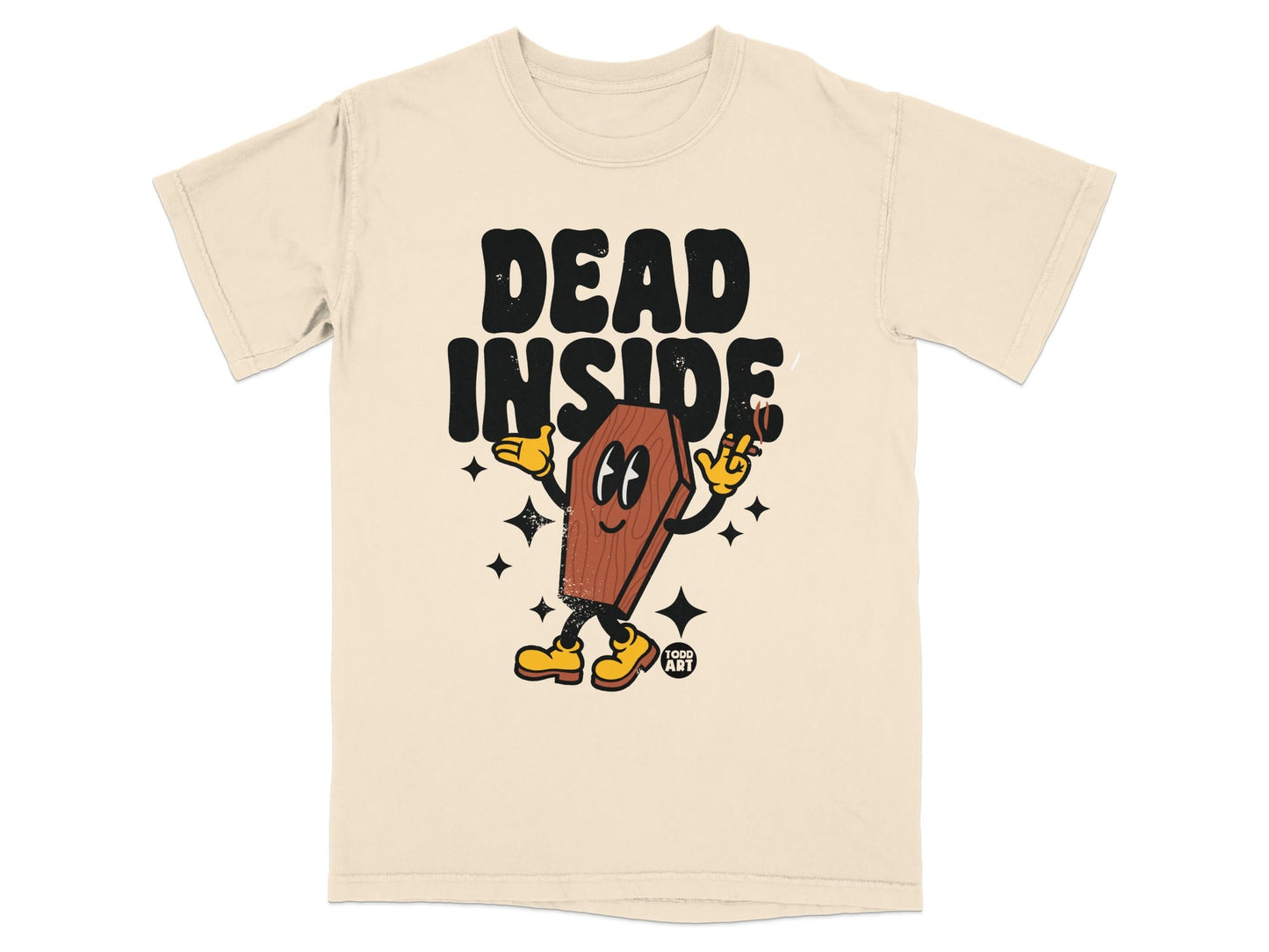 Cream t-shirt with cartoon coffin saying "DEAD INSIDE" and holding a cigarette.