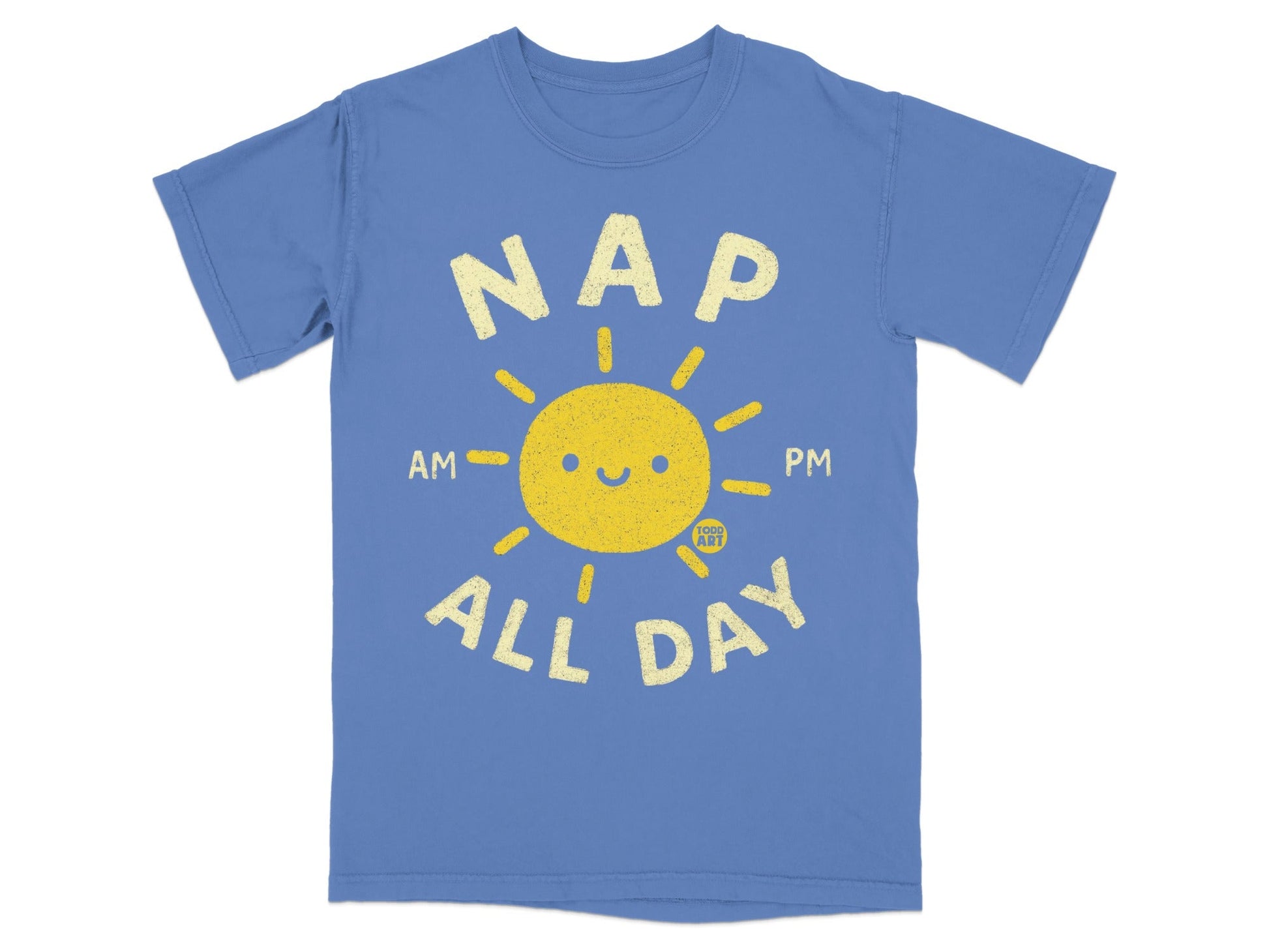 Blue t-shirt with yellow text "NAP AM PM ALL DAY" and smiling sun graphic.