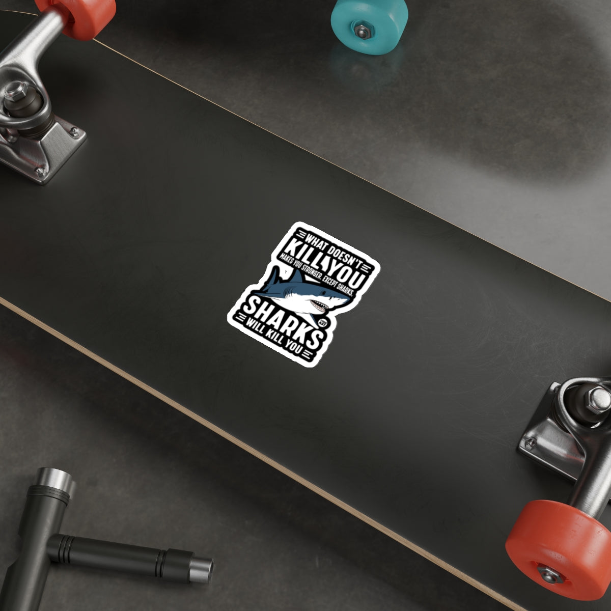 WHAT DOESNT KILL YOU EXCEPT SHARKS sticker 