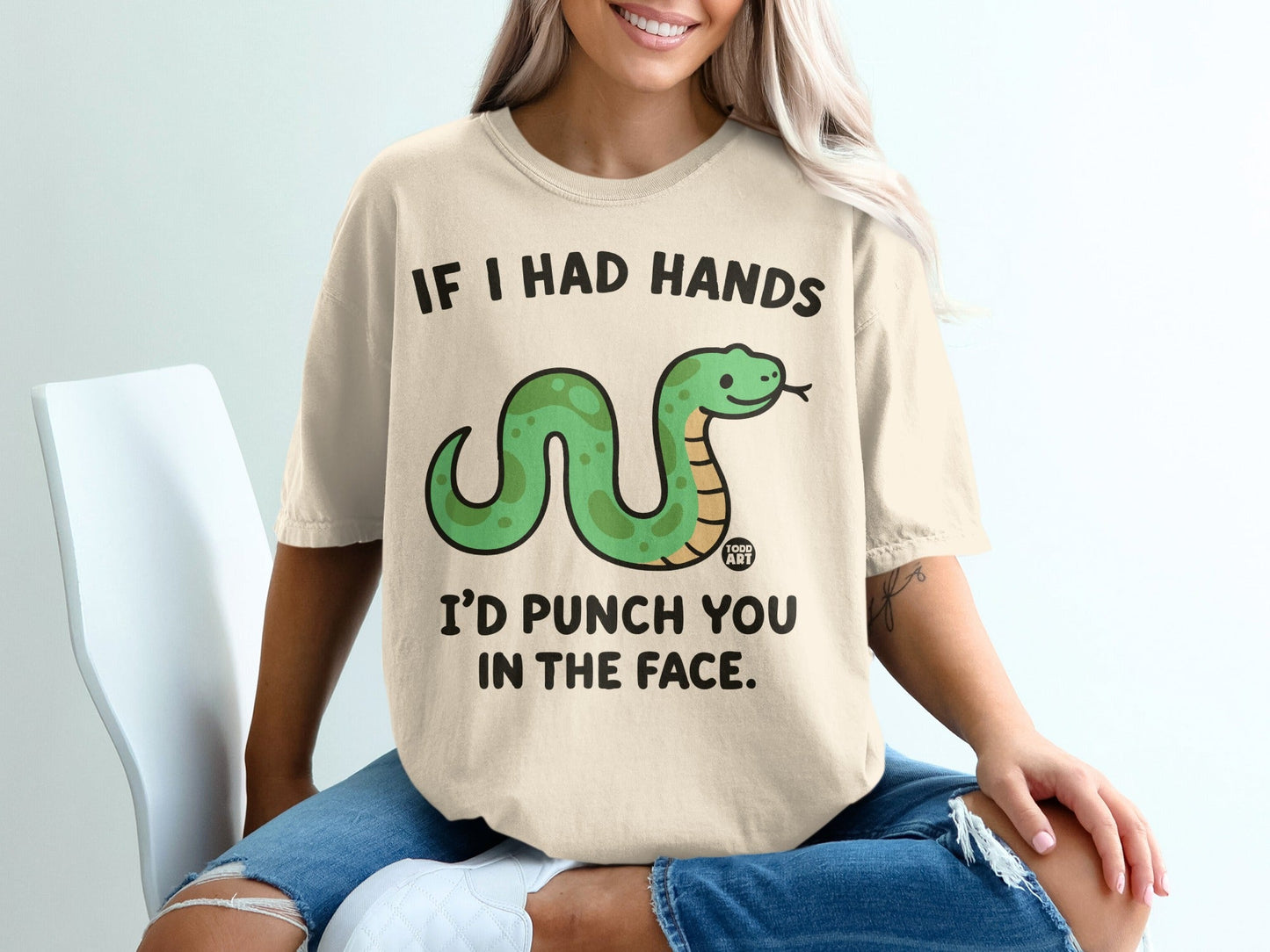T-shirt with green snake graphic and text: "If I had hands, I'd punch you in the face."