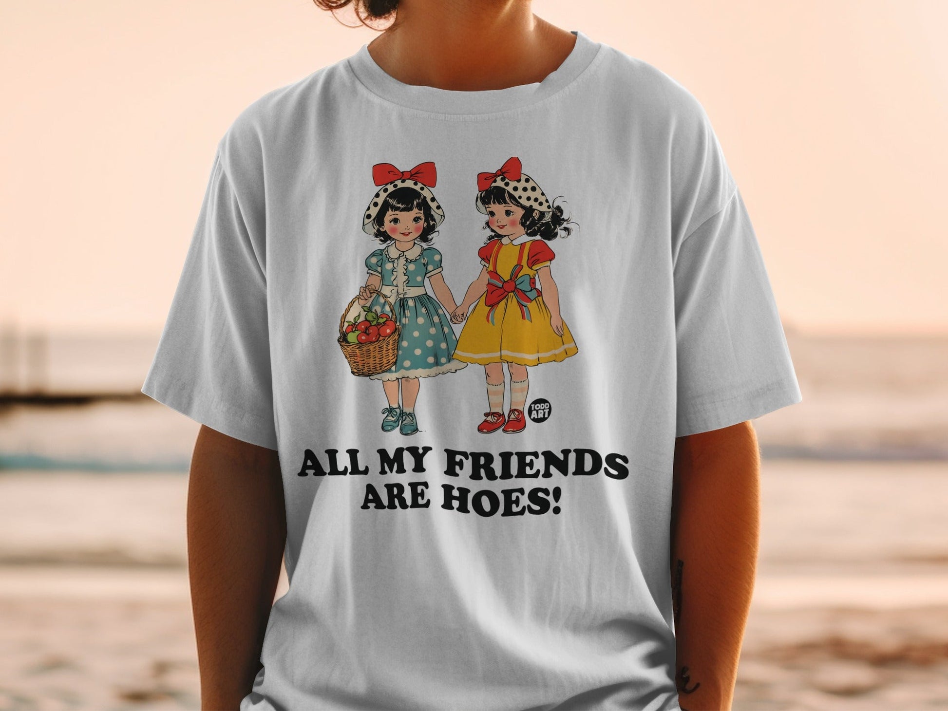 Two cartoon girls in vintage dresses holding hands and a basket of flowers.