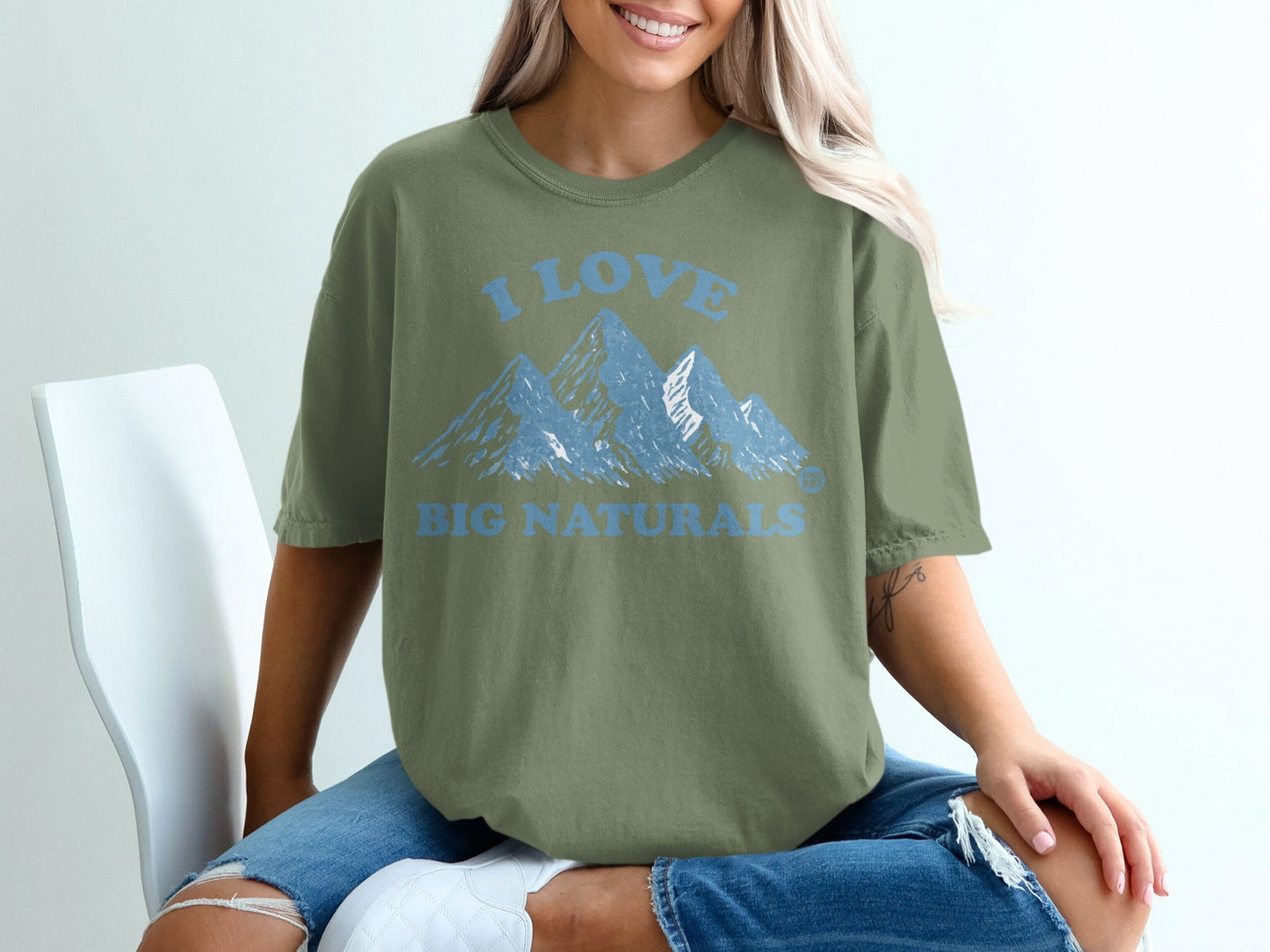 Olive green t-shirt with "I LOVE BIG NATURALS" and mountain graphic.