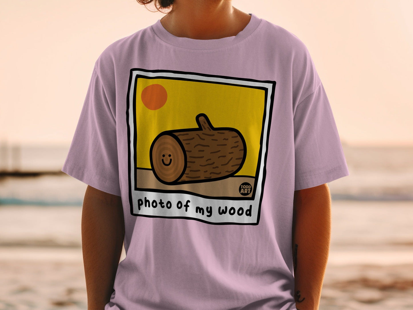 T-shirt with cartoon log graphic and text "photo of my wood".