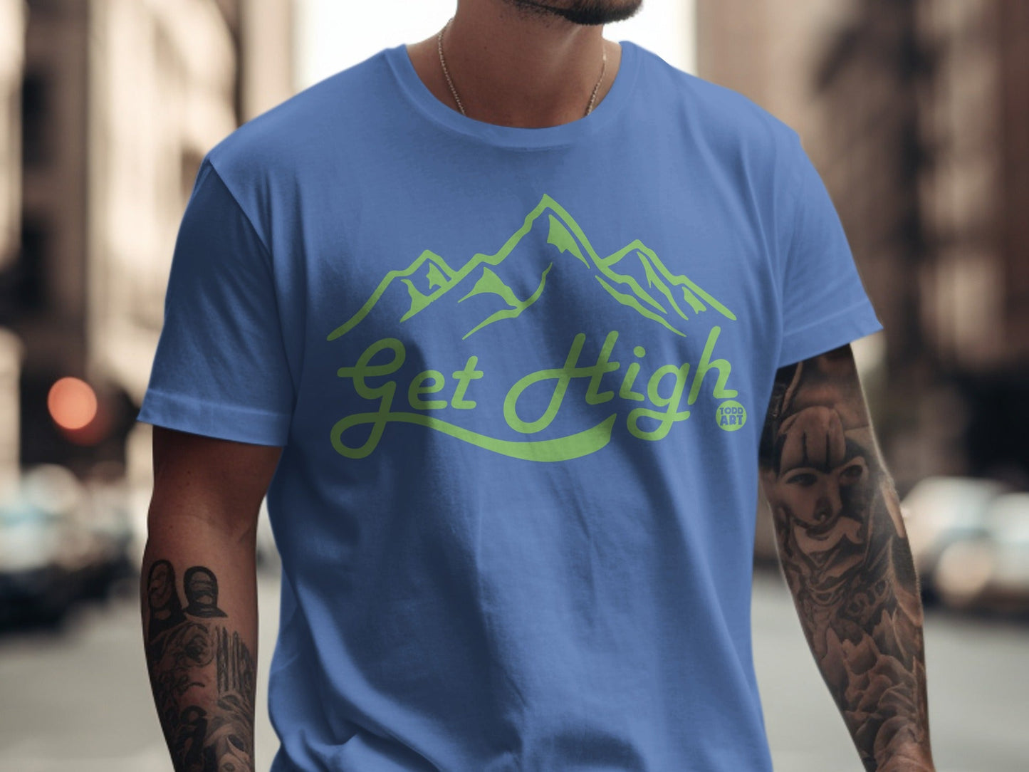 Blue t-shirt with green mountains and "Get High" text.
