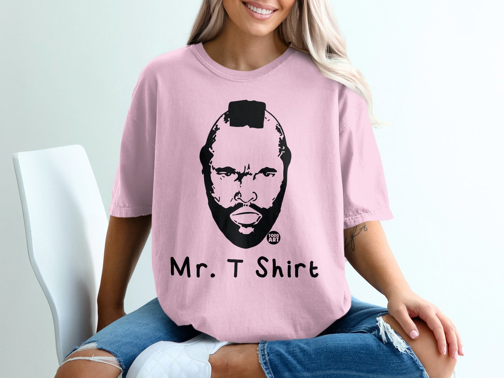 Pink t-shirt with Mr. T graphic and "Mr. T Shirt" text.