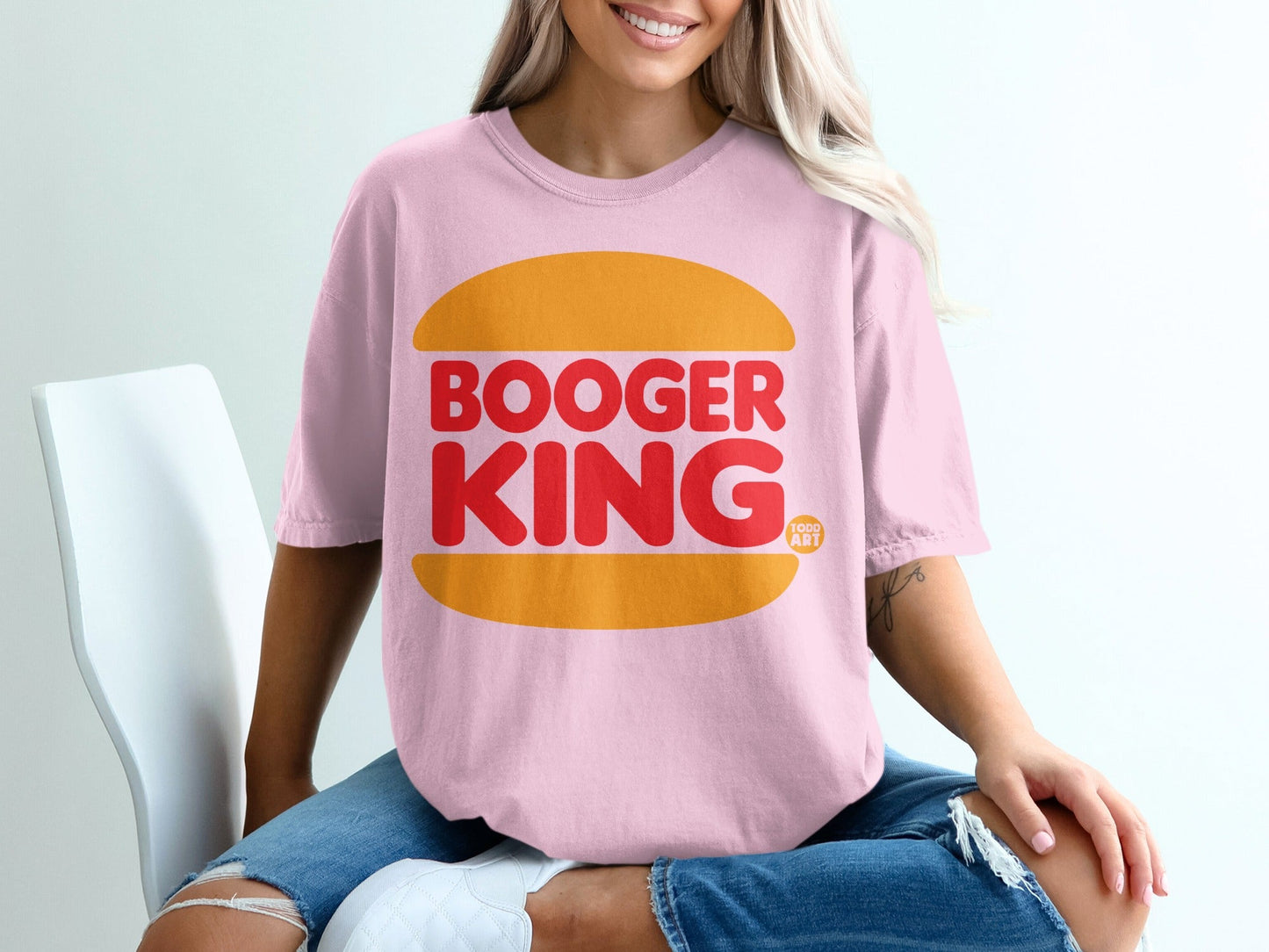 Pink t-shirt with "BOOGER KING" logo featuring a burger bun graphic.
