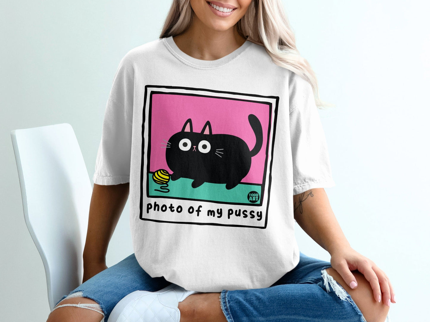 White t-shirt with black cat and yarn illustration, "photo of my pussy" text.