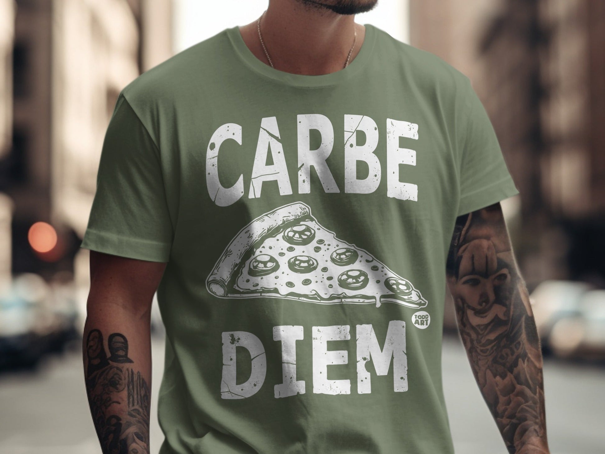 Green t-shirt with "CARPE DIEM" and pizza slice graphic.