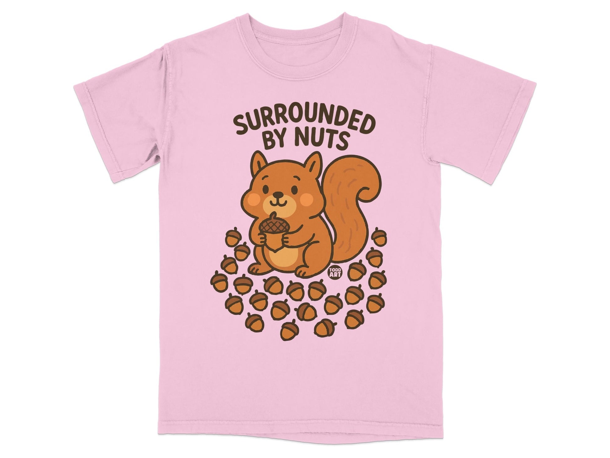 Pink t-shirt with a cartoon squirrel holding an acorn surrounded by acorns.