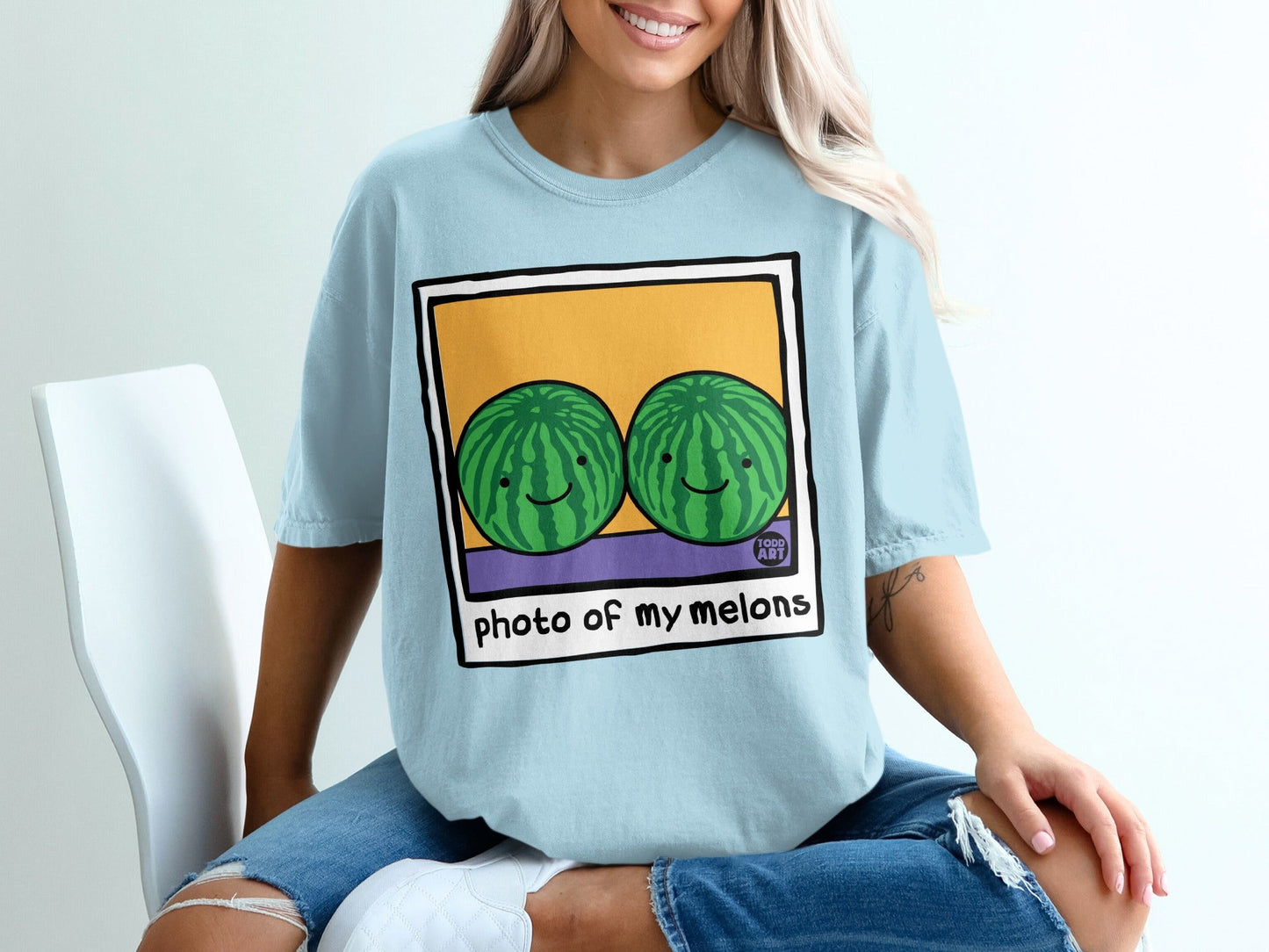 Light blue t-shirt with cartoon watermelons and "photo of my melons" text.