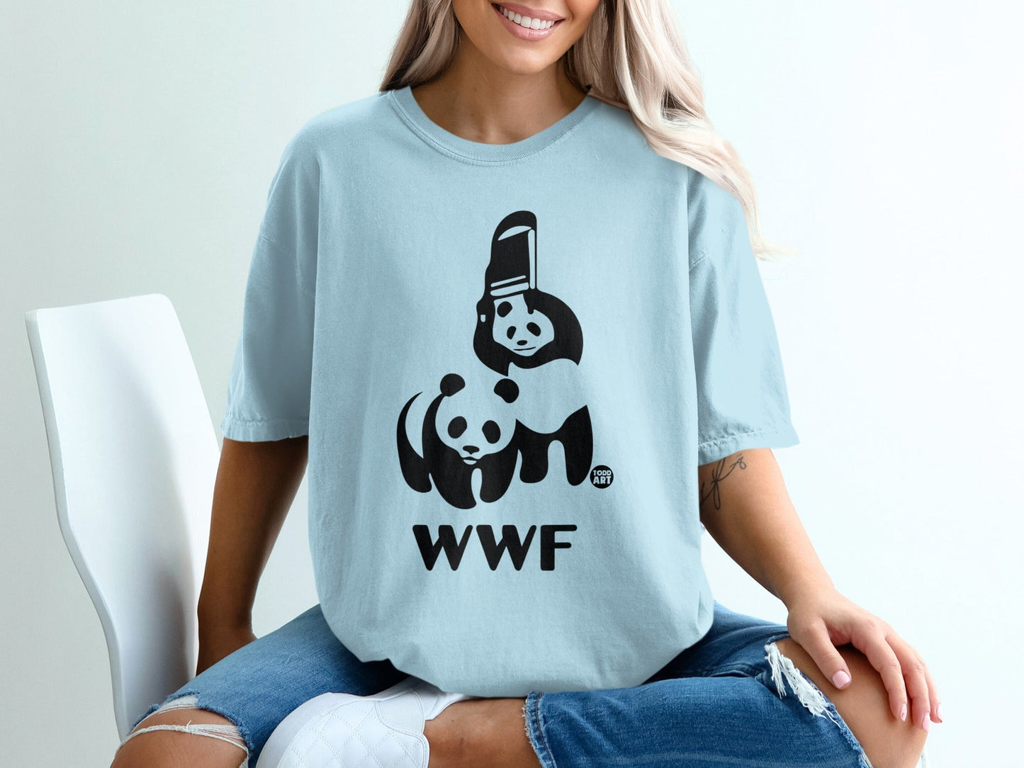 Light blue t-shirt with WWF panda logo and text.