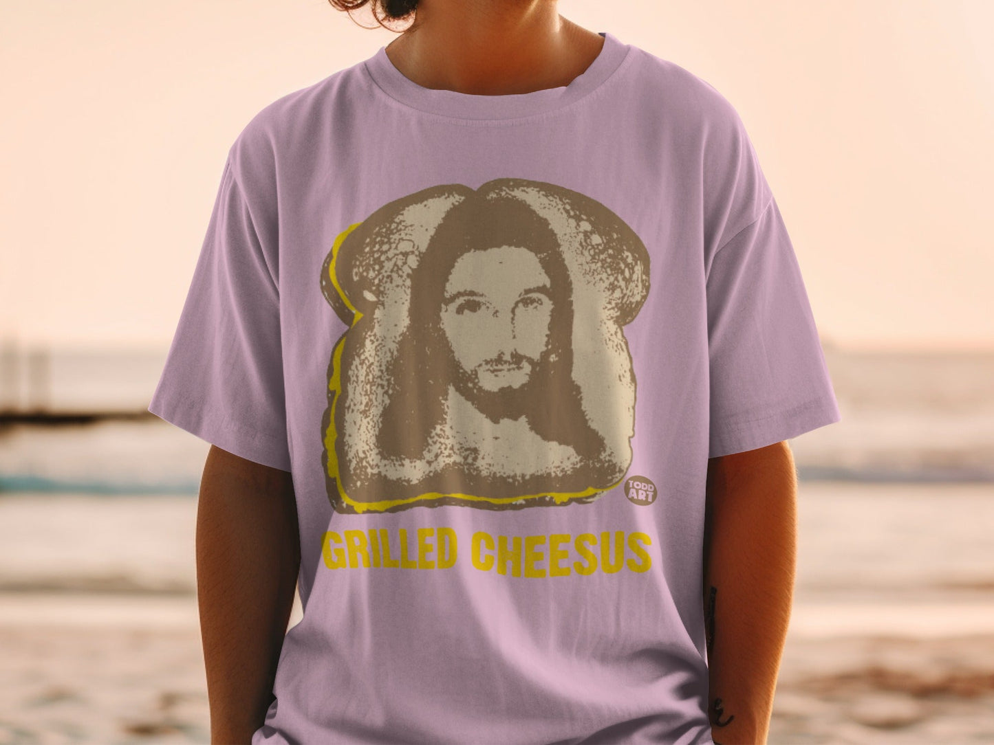 T-shirt with grilled cheese sandwich resembling Jesus' face.