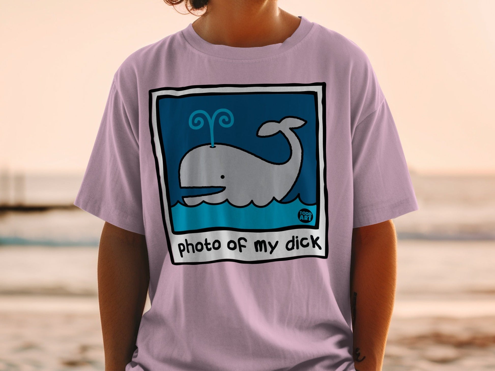 T-shirt with a cartoon whale illustration and "photo of my dick" text.