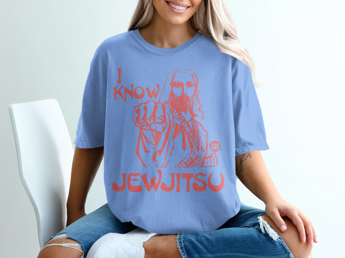 Light blue t-shirt with Jesus pointing and text that reads "I Know Jew Jitsu".