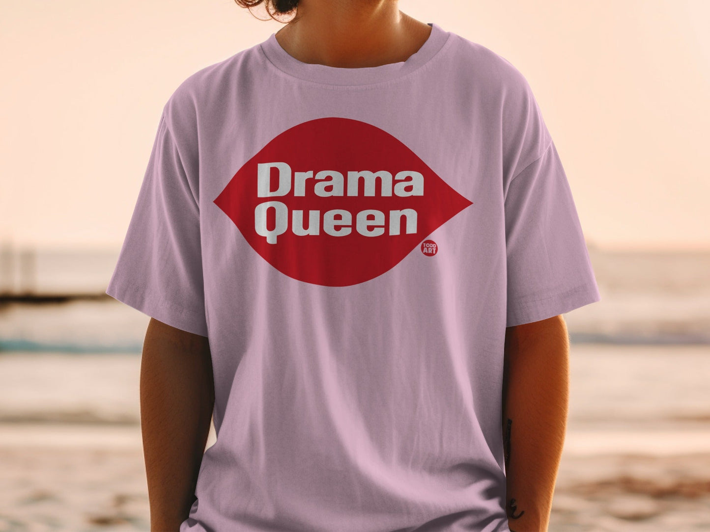 Light pink t-shirt with "Drama Queen" in bold red letters.