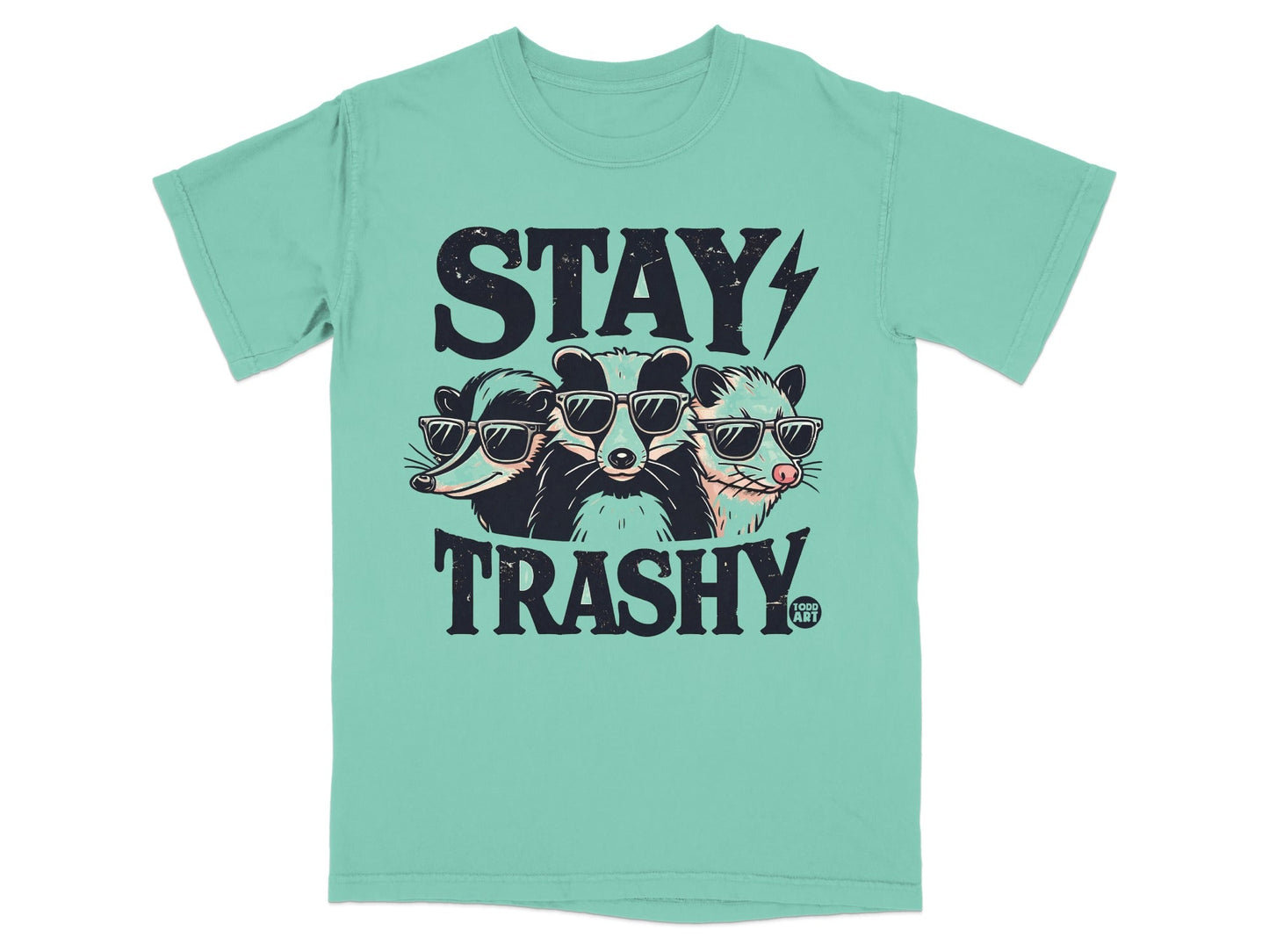 Three raccoons wearing sunglasses on a mint green t-shirt.