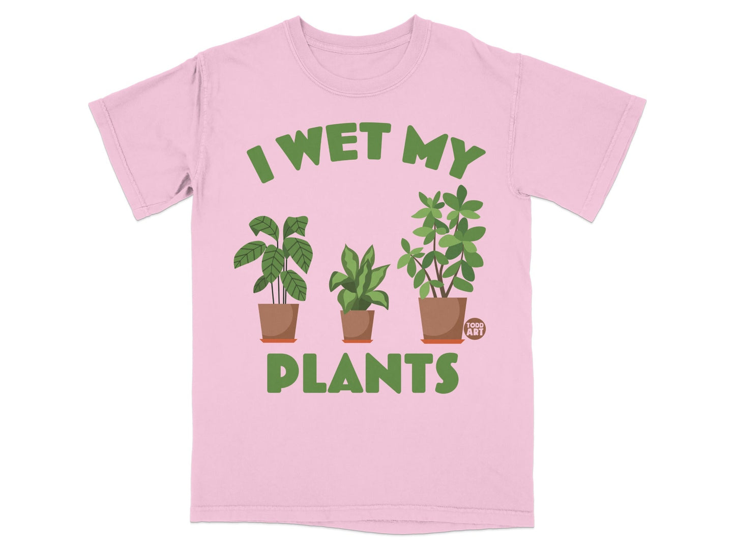Pink t-shirt with "I WET MY PLANTS" text and three potted plants.
