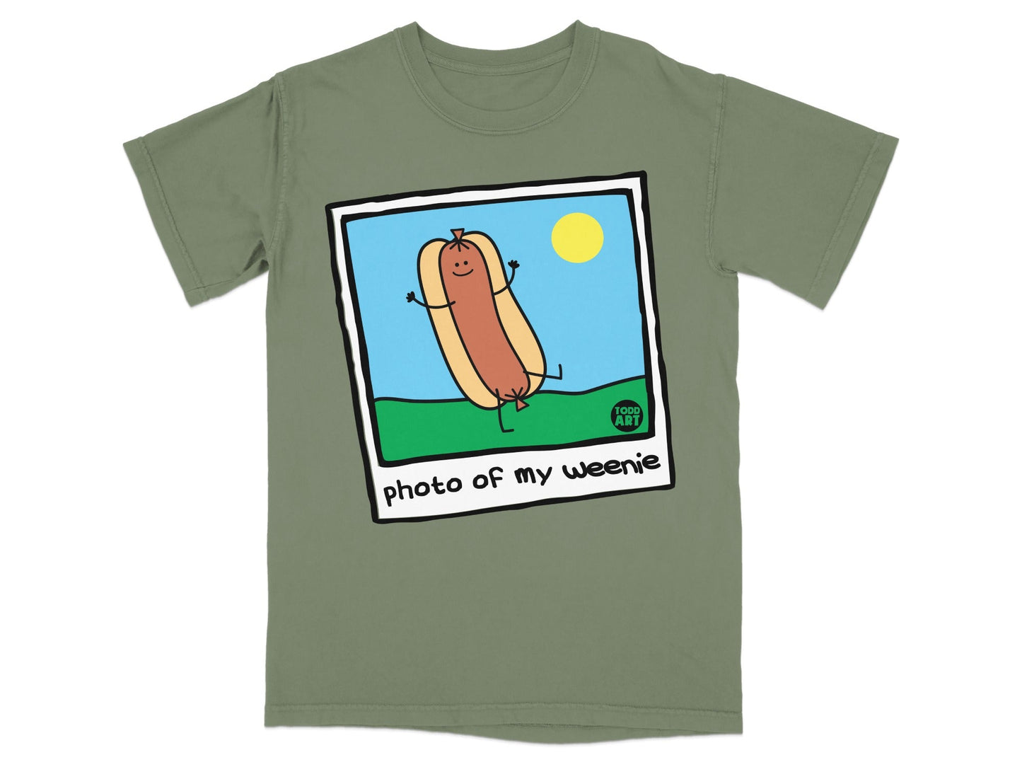T-shirt with a cartoon hot dog in a frame with the text "photo of my weenie".