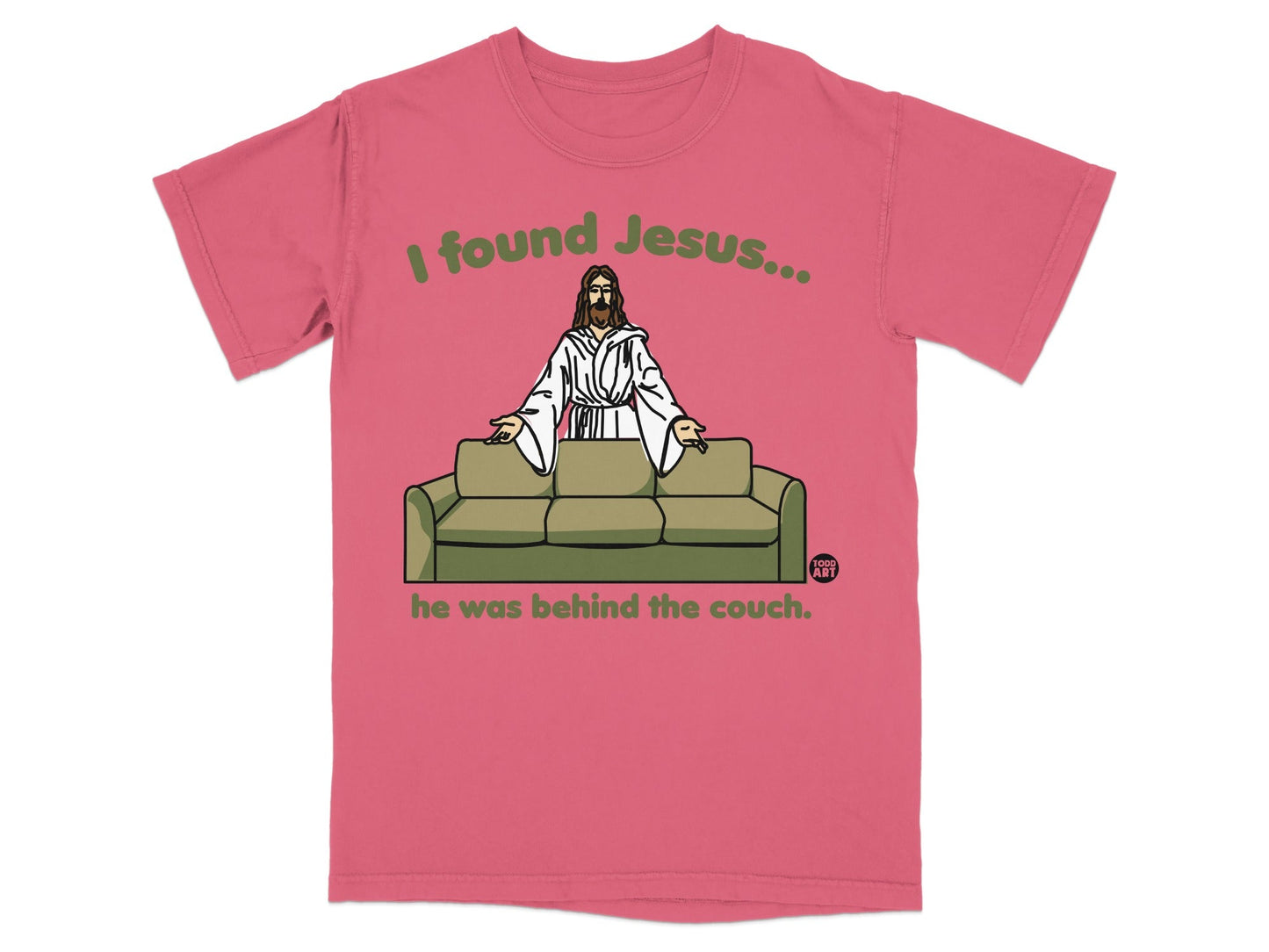 Coral t-shirt with "I found Jesus... he was behind the couch" graphic.