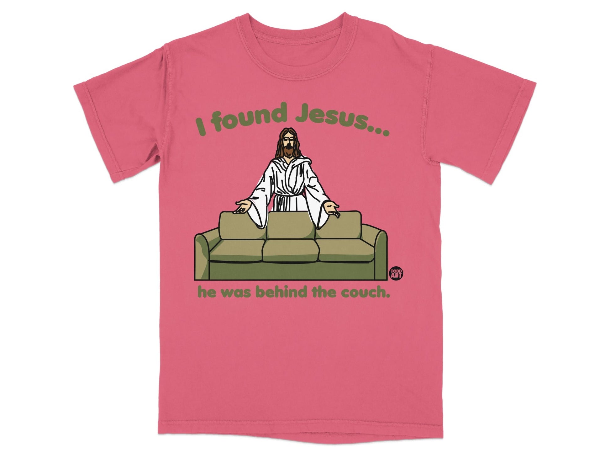 Coral t-shirt with "I found Jesus... he was behind the couch" graphic.