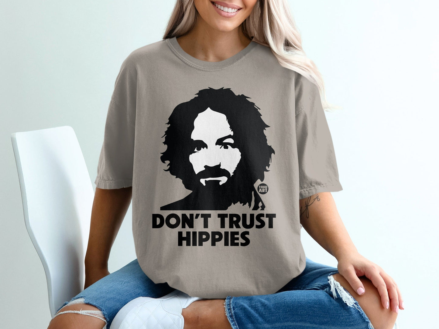 T-shirt with a black and white portrait of a man and the text "DON'T TRUST HIPPIES".