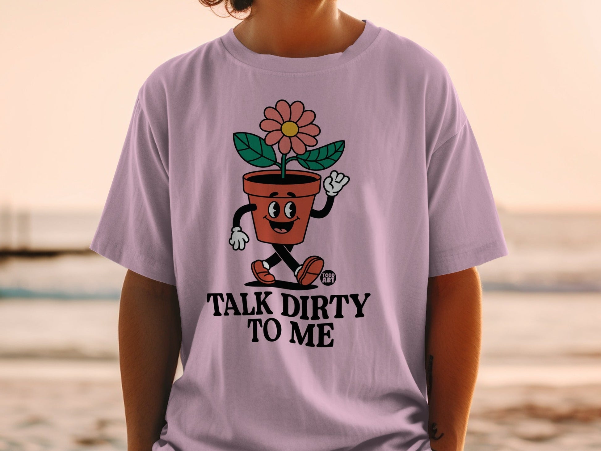 T-shirt with cartoon flower pot waving and text "TALK DIRTY TO ME".