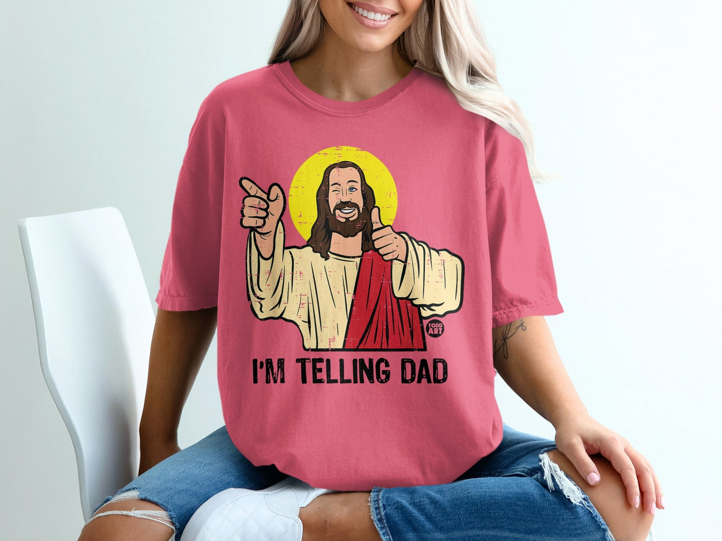 Jesus giving a thumbs up and pointing, with "I'M TELLING DAD" text.