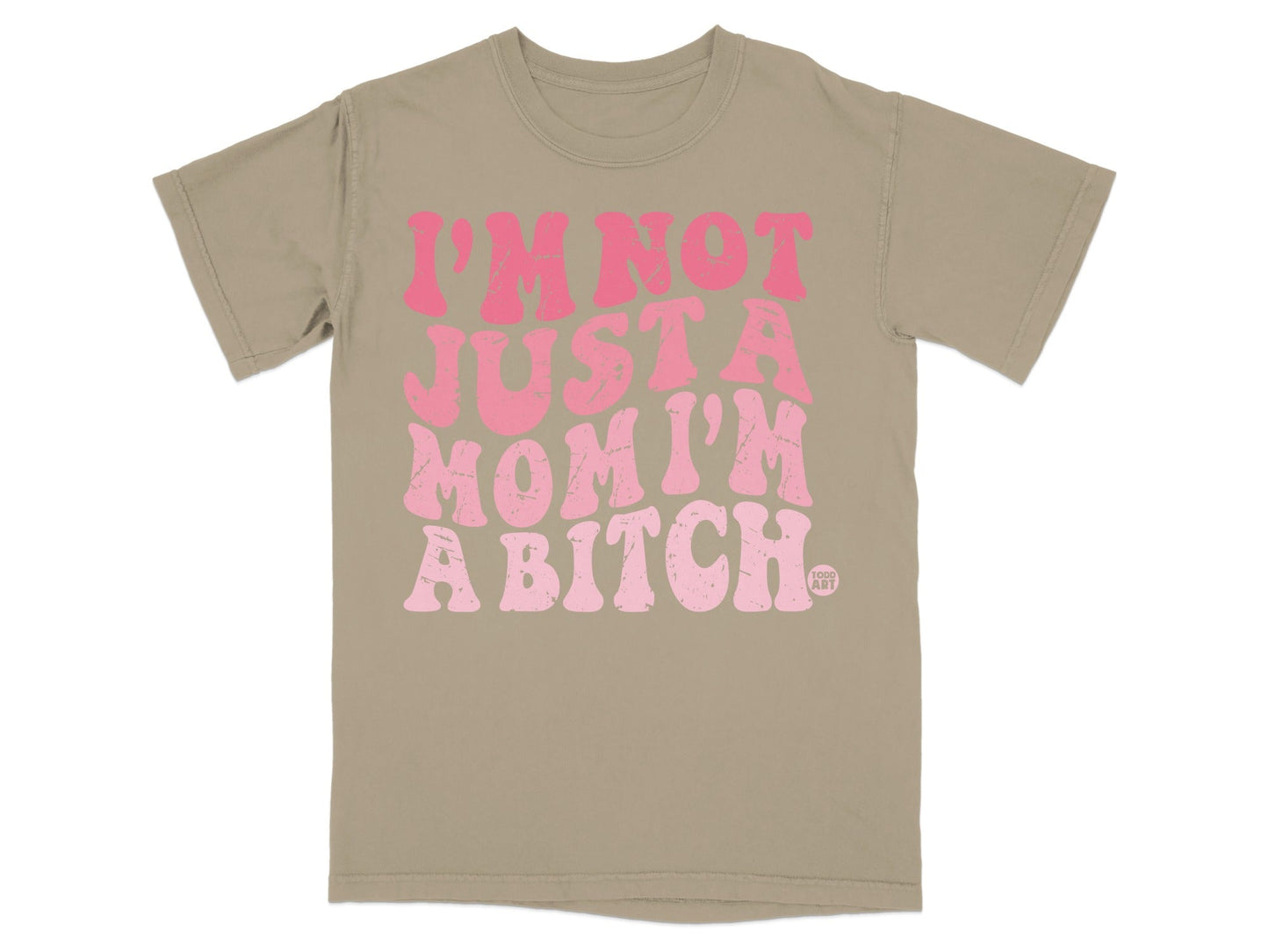 Tan t-shirt with pink text reading "I'm Not Just a Mom I'm a Bitch".
