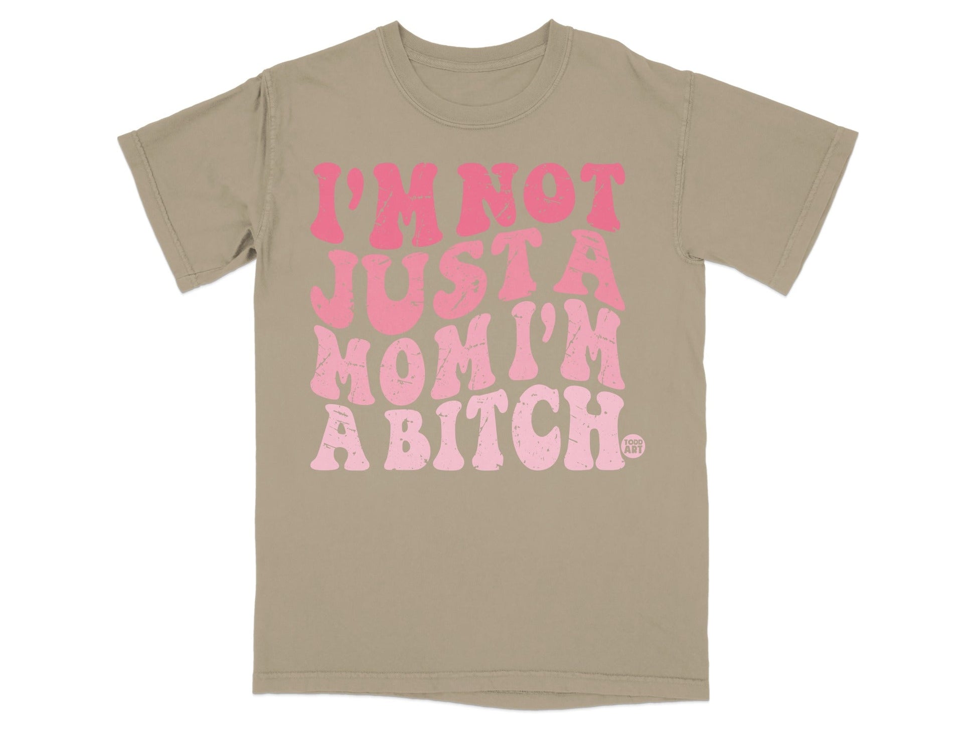 Tan t-shirt with pink text reading "I'm Not Just a Mom I'm a Bitch".
