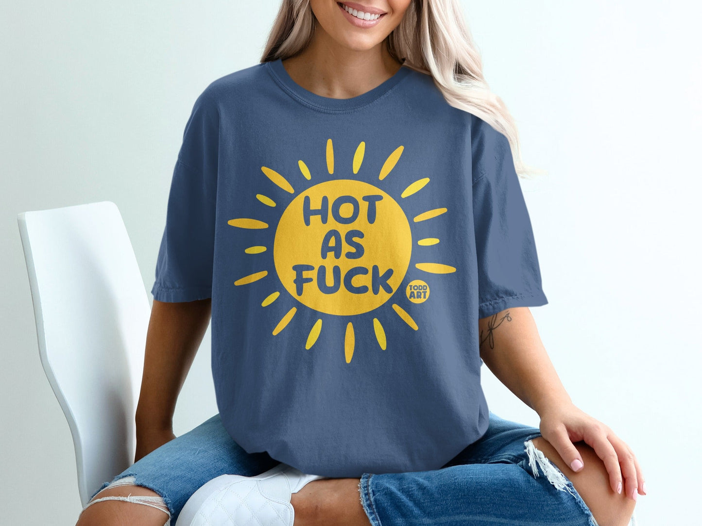 Blue t-shirt with yellow sun graphic and "HOT AS FUCK TODD ART" text.