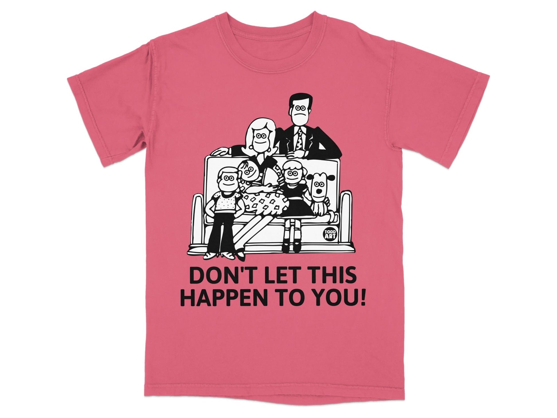 Pink t-shirt with cartoon family and dogs on couch, text "DON'T LET THIS HAPPEN TO YOU!".