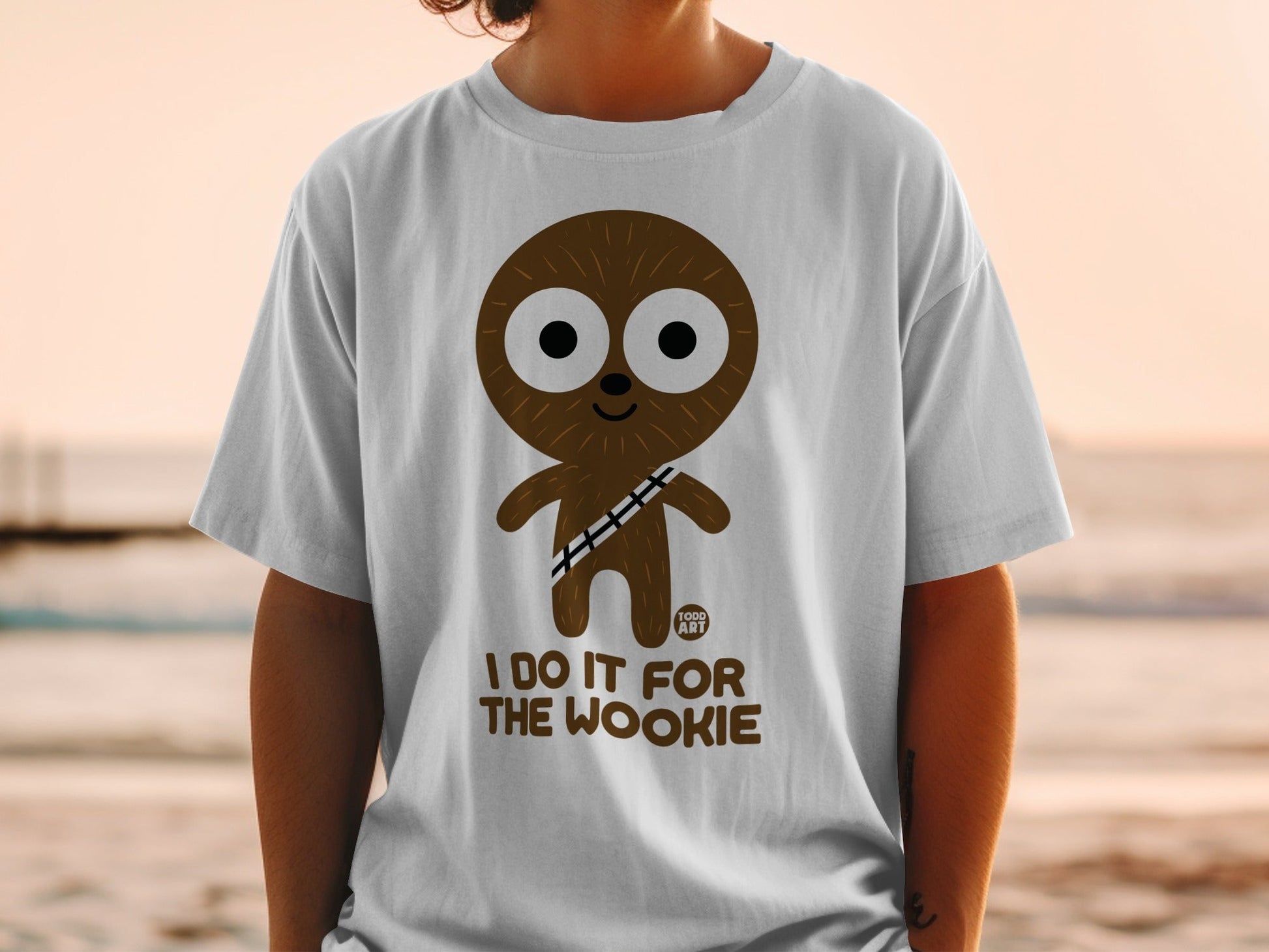 White t-shirt with "I DO IT FOR THE WOOKIE" and a cartoon wookiee.