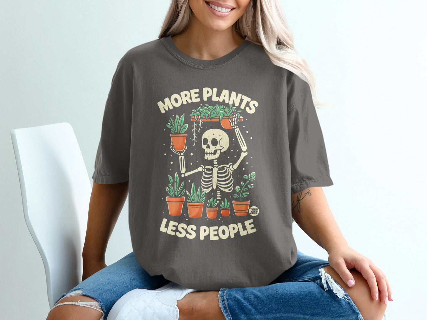Skeleton holding potted plants, "More Plants Less People" text.