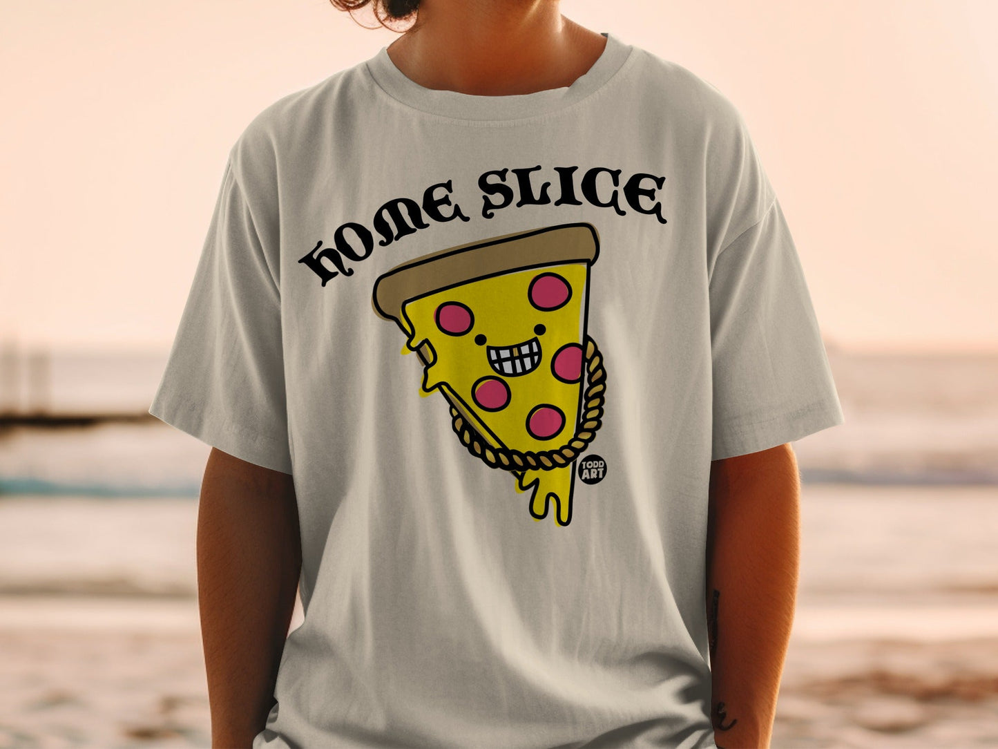 T-shirt with a cartoon pizza slice with a gold chain and "HOME SLICE" text.
