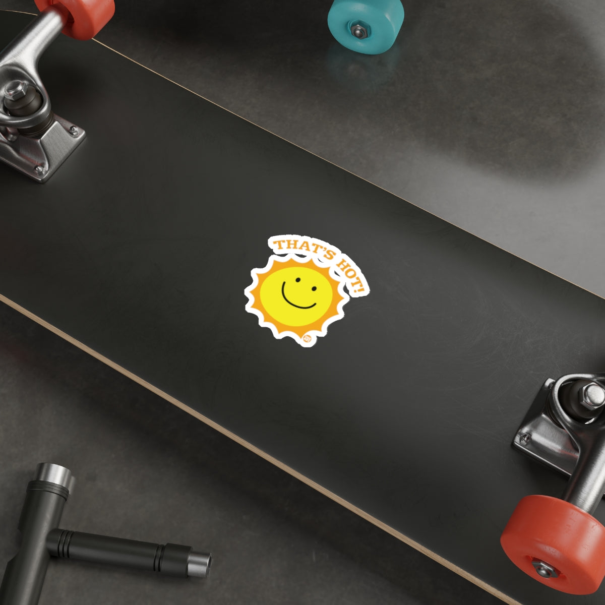 That's Hot Smiley Face Sticker on Skateboard Deck