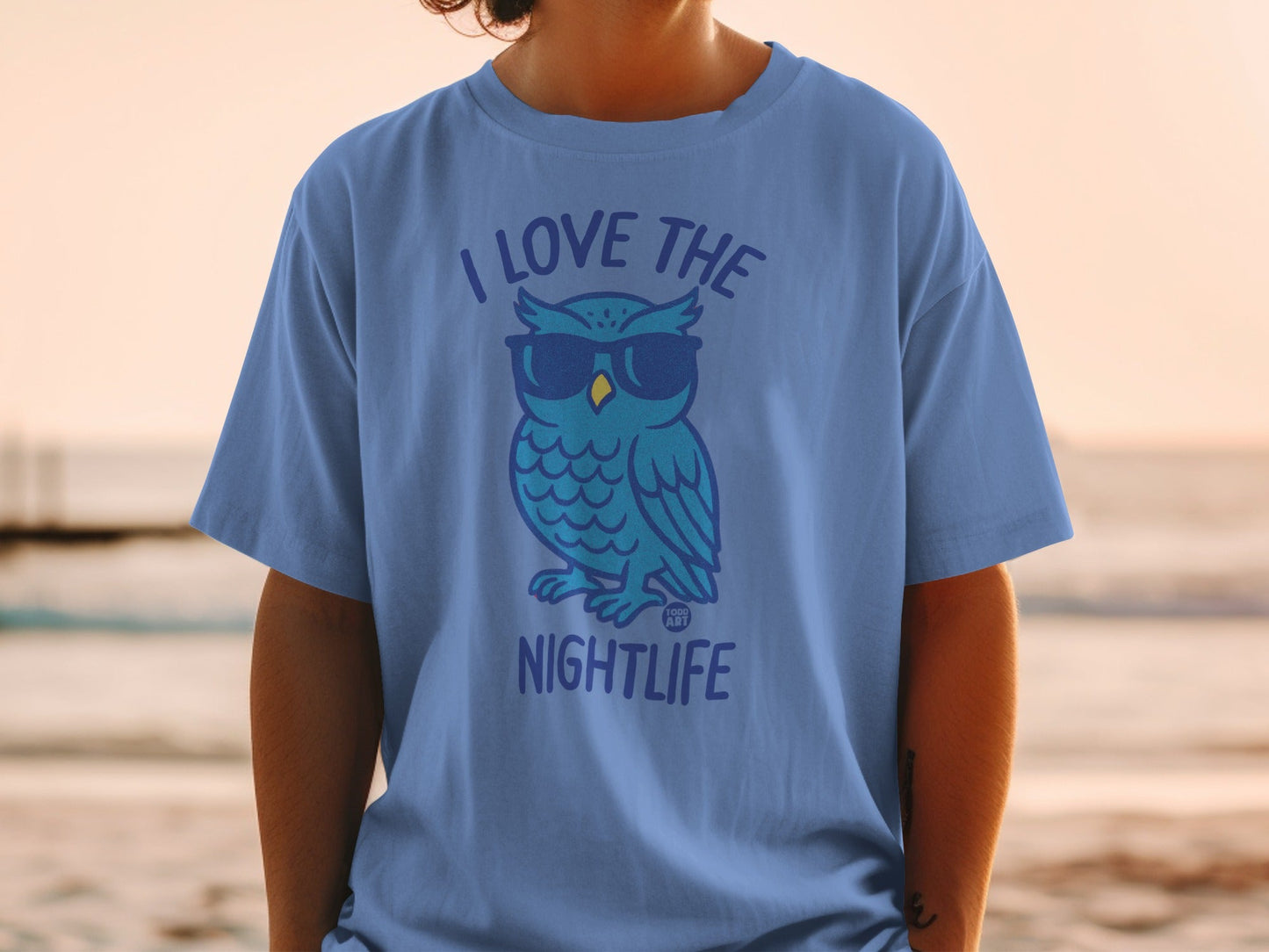 Blue t-shirt with cartoon owl wearing sunglasses and text "I love the nightlife".